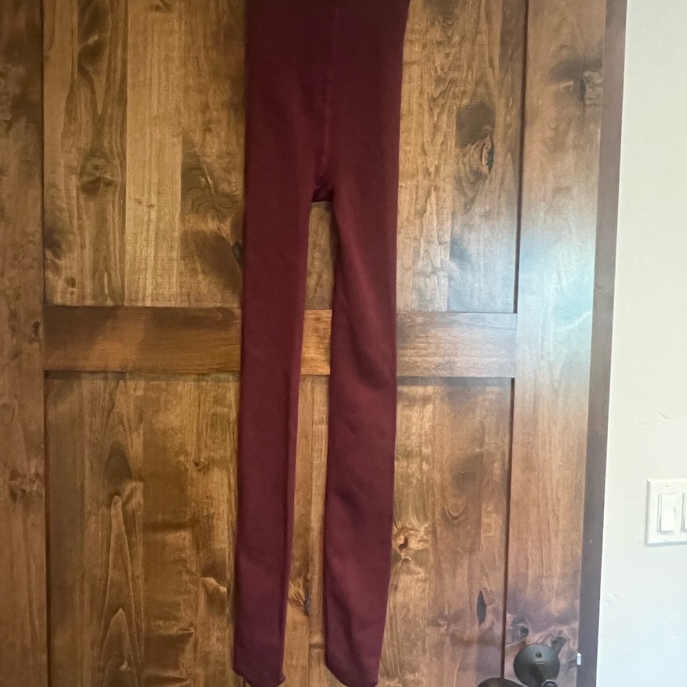 2 pair of  fleece  lined tights. 1 Maroon and 1 black, size large.